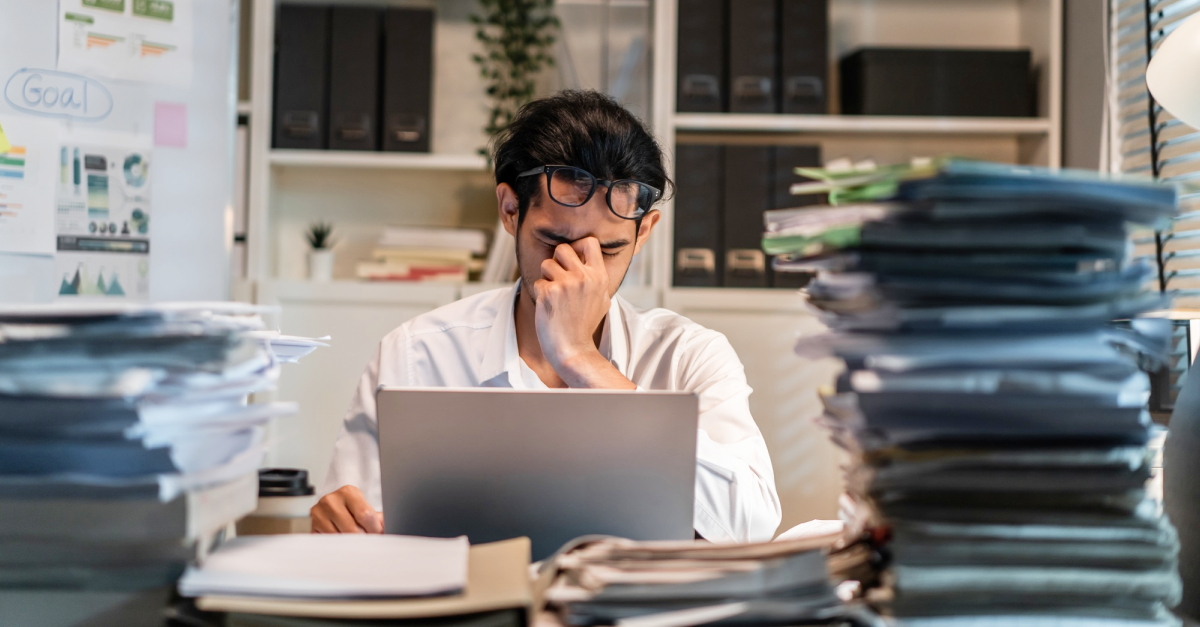Photo of man with work overload